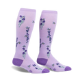 Pair of purple knee-high socks with a lavender and bee design.  Features small lavender sprigs and busy bees on a light purple background.