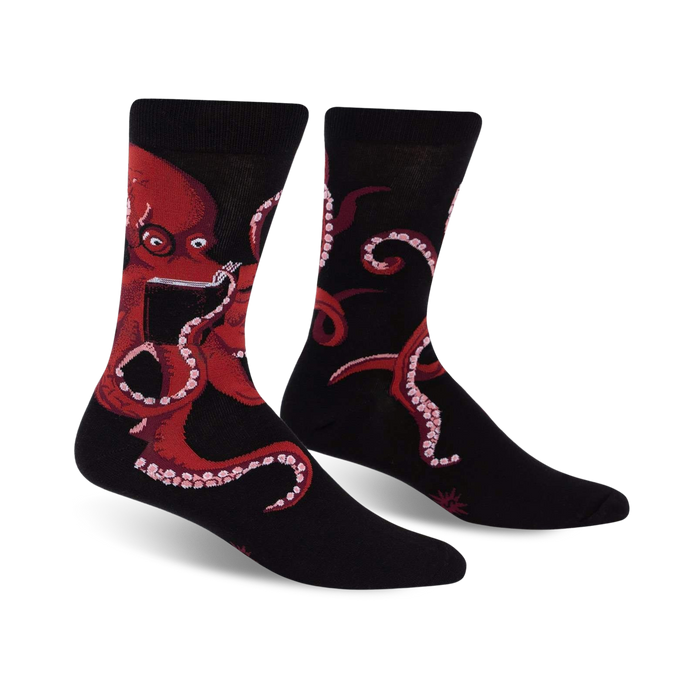 black crew socks with a red octopus holding a book and pipe. 