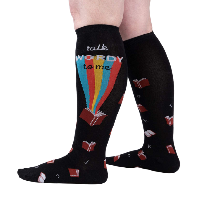 Lifestyle shot showing the socks on a person's legs, showcasing the design and fit.