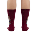 Back view of the socks worn on a person's legs, showcasing the design on the back of the socks.