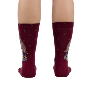 Back view of the socks worn on a person's legs, showcasing the design on the back of the socks.
