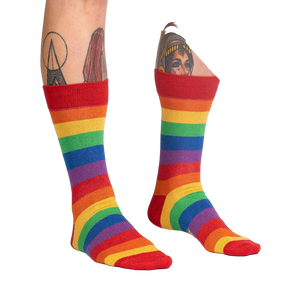 Lifestyle shot of a person wearing the rainbow shimmer socks, showcasing the fit and style.