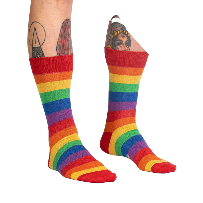 Lifestyle shot of a person wearing the rainbow shimmer socks, showcasing the fit and style.