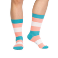 Flat lay of Trans Pride socks showing details of the design and colors.