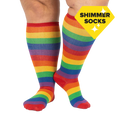 Lifestyle shot: A person's legs wearing the rainbow knee-high socks. The socks are the focus; the background is plain white.