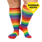 Lifestyle shot: A person's legs wearing the rainbow knee-high socks. The socks are the focus; the background is plain white.