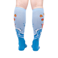Rear view of a pair of 'Beauty in Water' knee-high socks, highlighting the full design detail on the back of the socks.