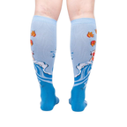 Rear view of a pair of 'Beauty in Water' knee-high socks, highlighting the full design detail on the back of the socks.