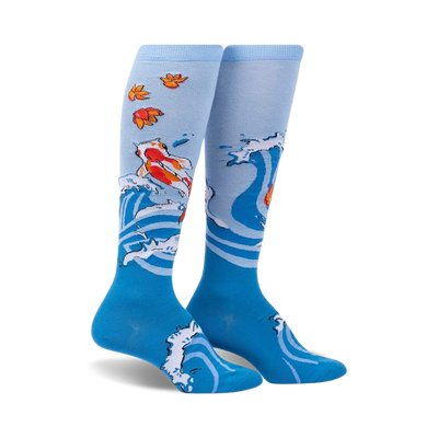 blue knee-high socks for women with orange and white koi fish design and orange leaves, title: beauty in water  