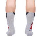 Rear view of the 'Moon Walk in the Morning' socks on a person's legs, showcasing the back design.
