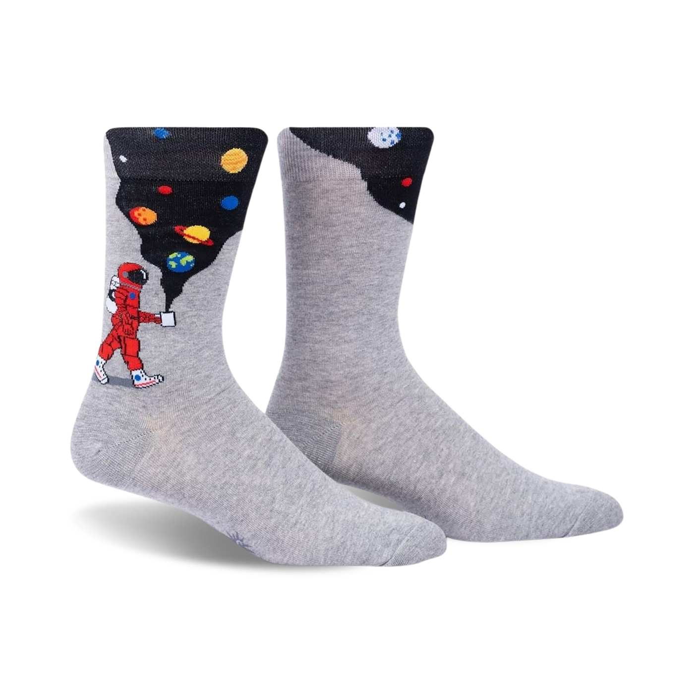 Pair of grey crew socks with a design featuring an astronaut painting planets onto a dark background. 