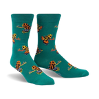 Pair of teal crew socks with a pattern of colorful poison dart frogs.  Orange, yellow, and black frogs on a teal background.
