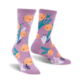 Lavender crew socks featuring a whimsical pufferfish and sea plant design. Orange pufferfish stand out against the purple background.