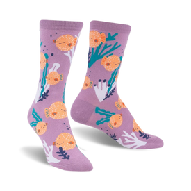 front view of two purple socks with orange pufferfish, seaweed and coral designs.