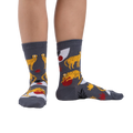 Lifestyle shot showing the socks on a person's legs against a white background.
