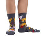 Lifestyle shot showing the socks on a person's legs against a white background.