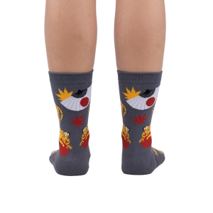Rear view of the socks on a person's legs, showcasing the full design.