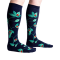 Lifestyle shot showing the socks on a person's legs, showcasing fit and style.