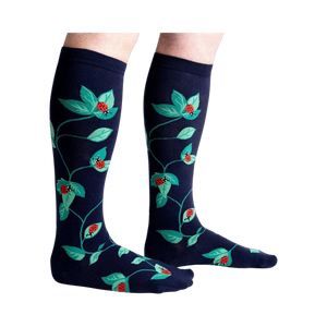 Lifestyle shot showing the socks on a person's legs, showcasing fit and style.