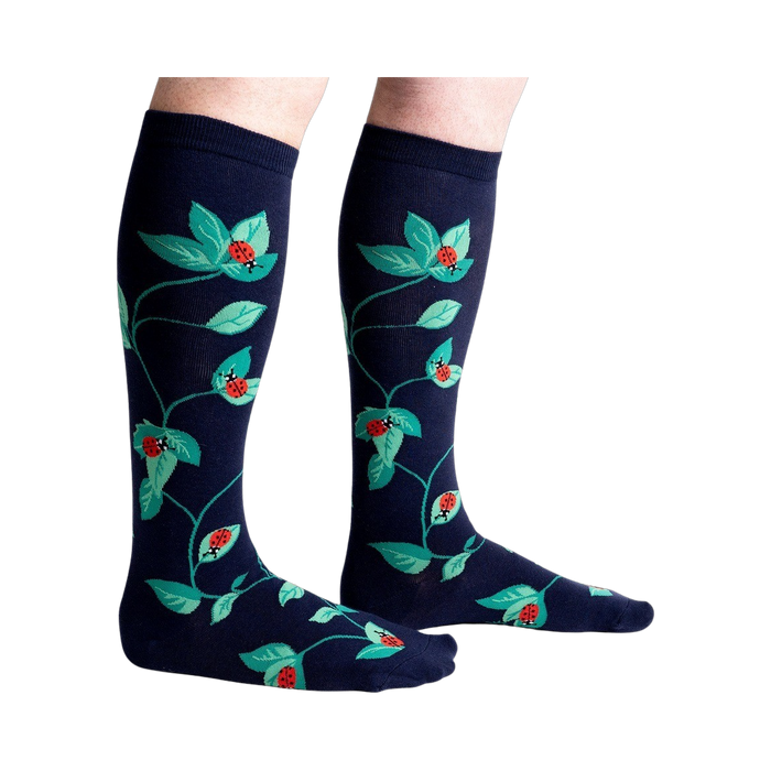 Lifestyle shot showing the socks on a person's legs, showcasing fit and style.