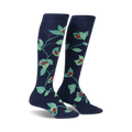 Pair of navy blue knee-high socks with a repeating pattern of ladybugs and green leaves.