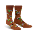 Brown crew socks with a fun design featuring campervans, Bigfoot, and pine trees. Perfect for travel and adventure!