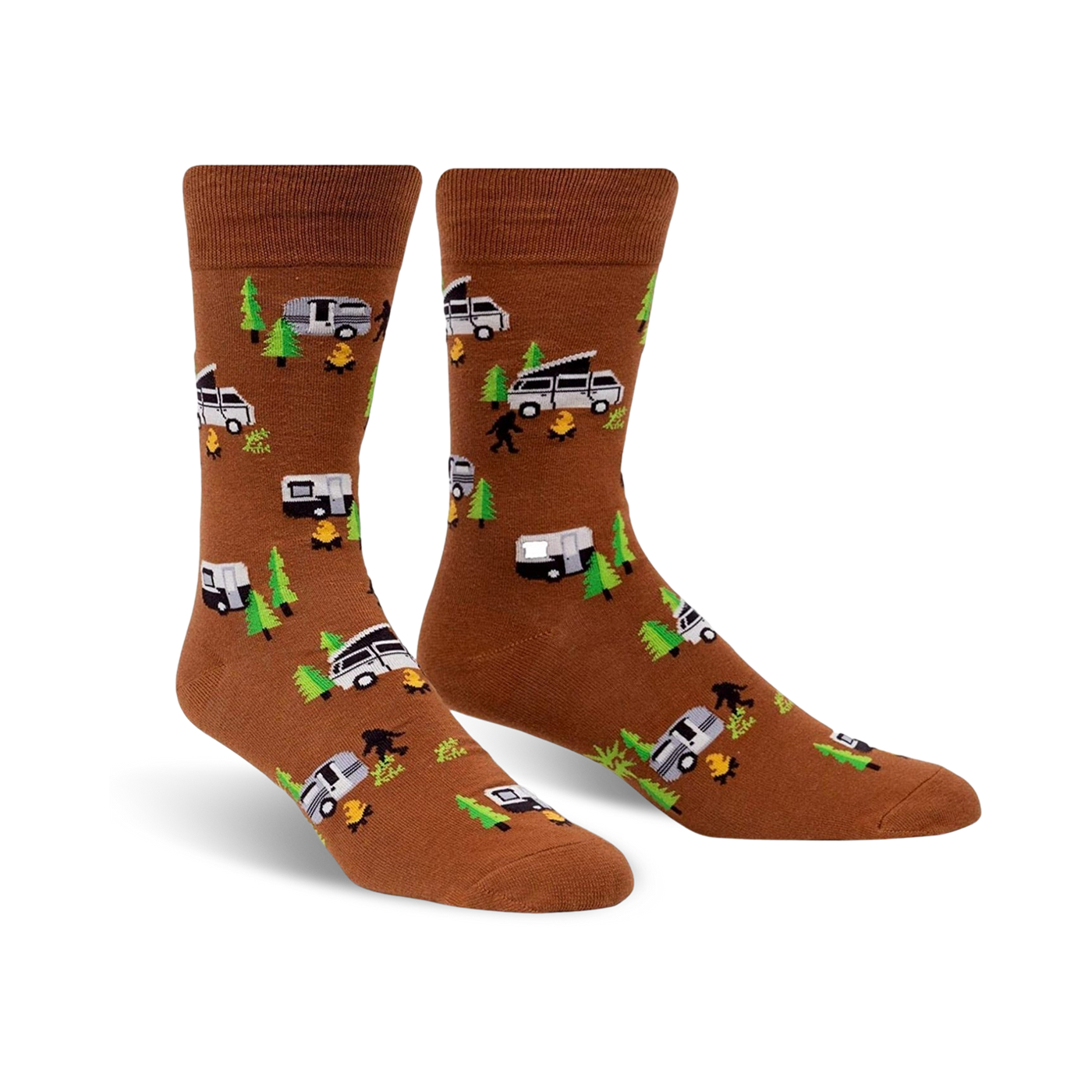 Brown crew socks with a fun design featuring campervans, Bigfoot, and pine trees. Perfect for travel and adventure!