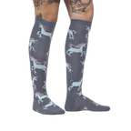 Lifestyle shot: Model wearing the 'Rolling With My Ponies' knee-high socks, showing the fit and pattern on the leg.