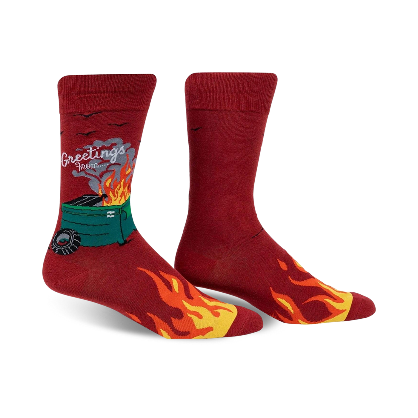 A pair of men's crew socks in red, featuring a burning dumpster graphic, flames along the bottom, and the text 'Greetings From'.