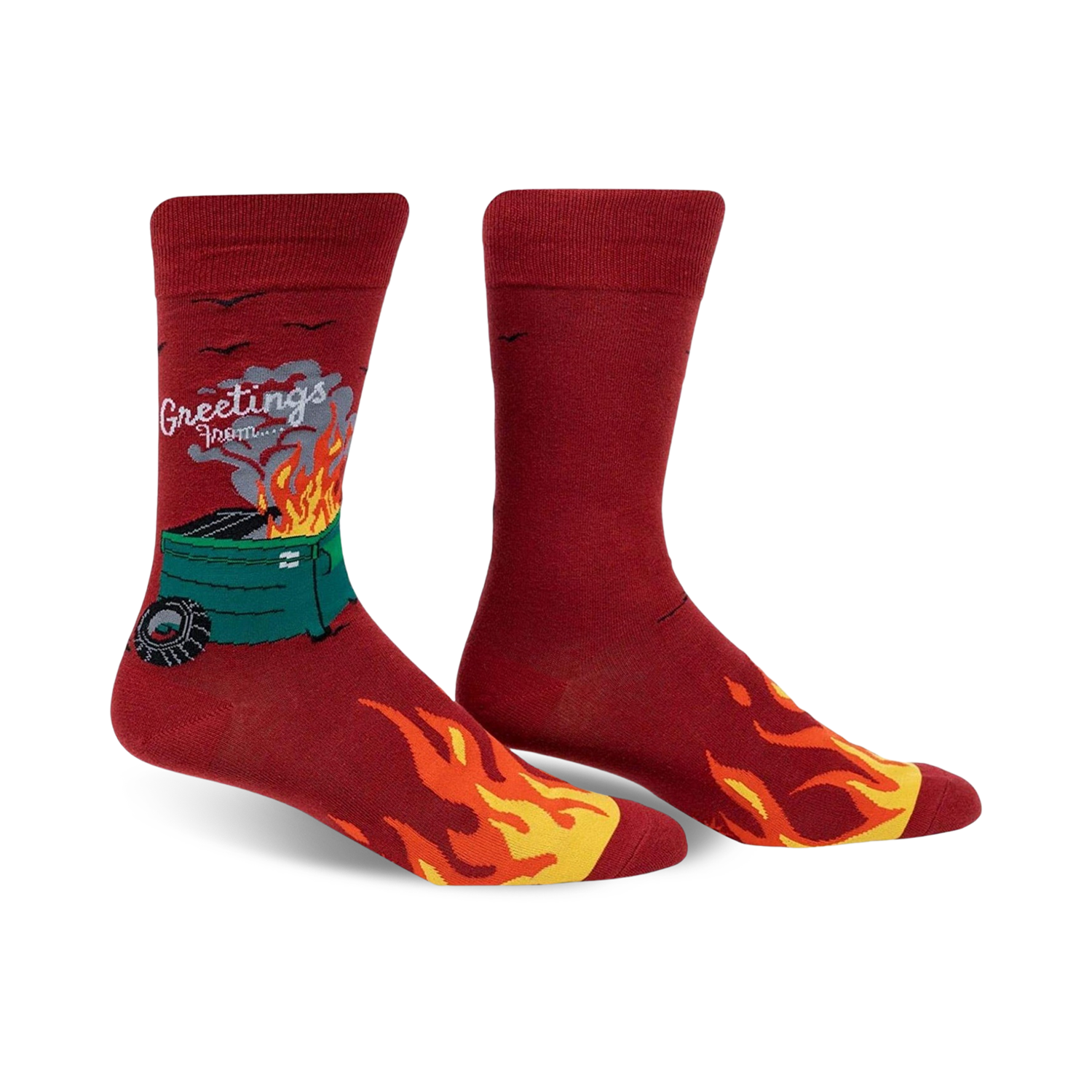 A pair of men's crew socks in red, featuring a burning dumpster graphic, flames along the bottom, and the text 'Greetings From'.