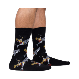 Lifestyle shot showing the socks on a person's feet against a white background.  The socks' design is clearly visible.
