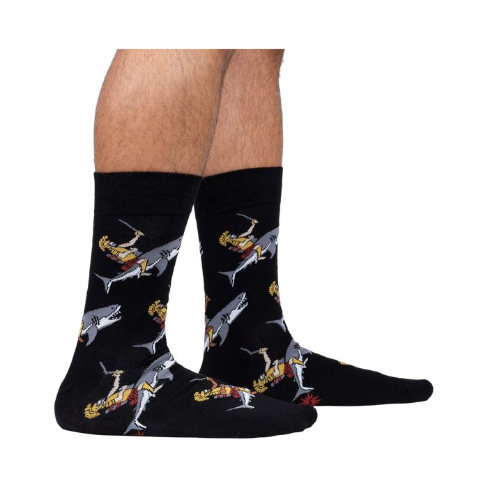 Lifestyle shot showing the socks on a person's feet against a white background.  The socks' design is clearly visible.