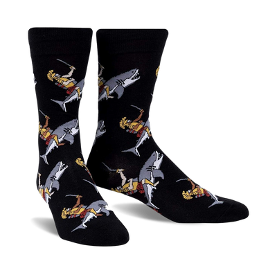  men's crew socks with cartoon gladiators battling sharks design. black.   