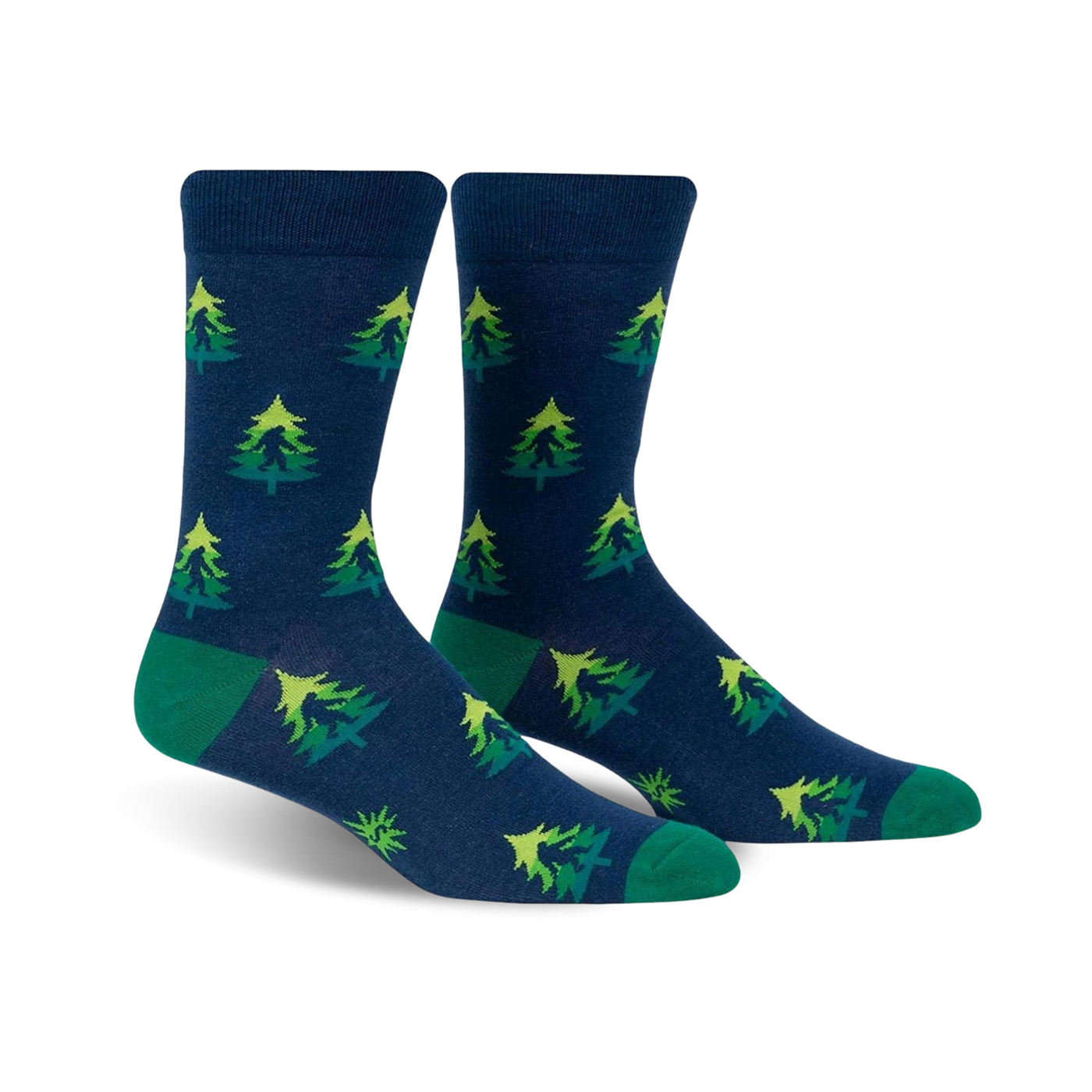 Pair of crew socks in navy blue with repeating lime green and darker green Christmas tree pattern. Green cuffs.