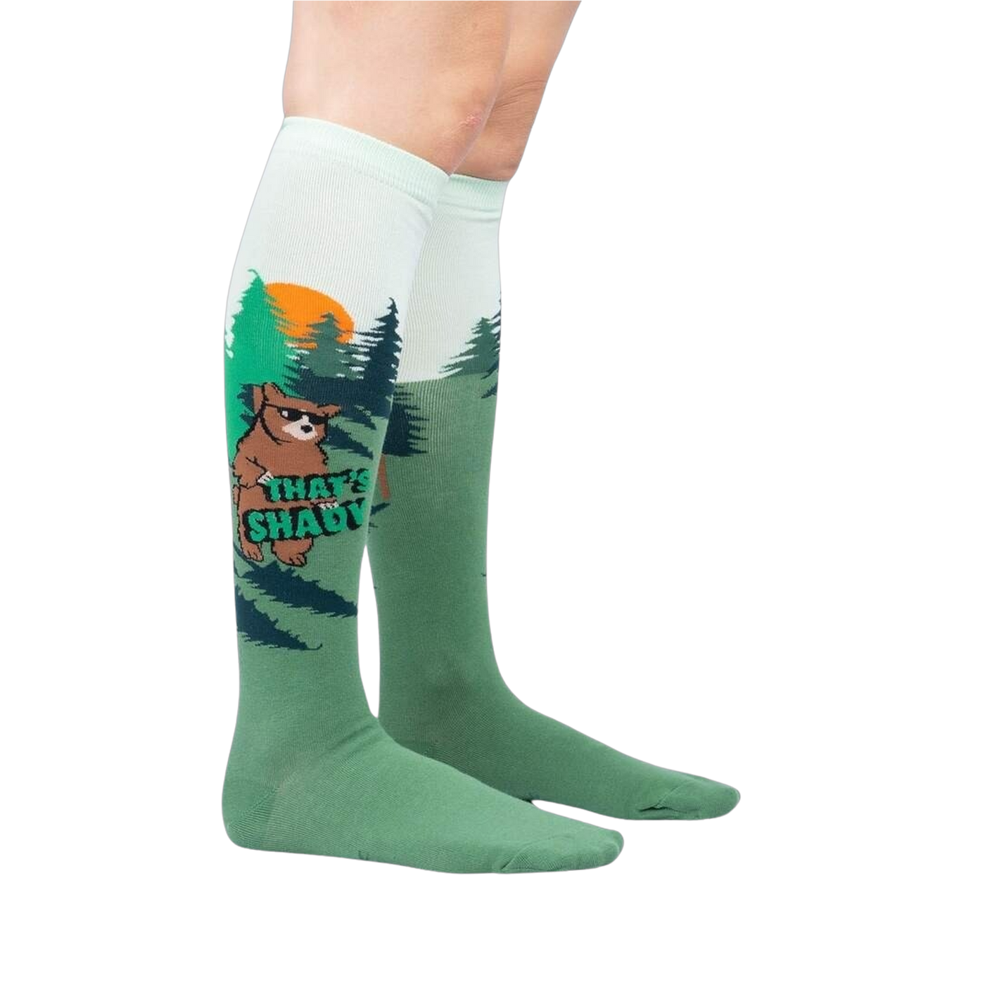 Lifestyle shot of model wearing a pair of 'That's Shady' knee-high socks.