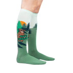 Lifestyle shot of model wearing a pair of 'That's Shady' knee-high socks.