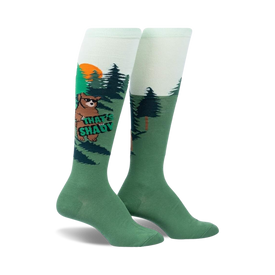   green knee-high socks with bears wearing sunglasses and holding signs that say 'that's shady' in front of a sunset and pine trees.    