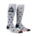 Knee-high socks in grey with a campfire and woodland creature design.  Dark blue and orange accents.