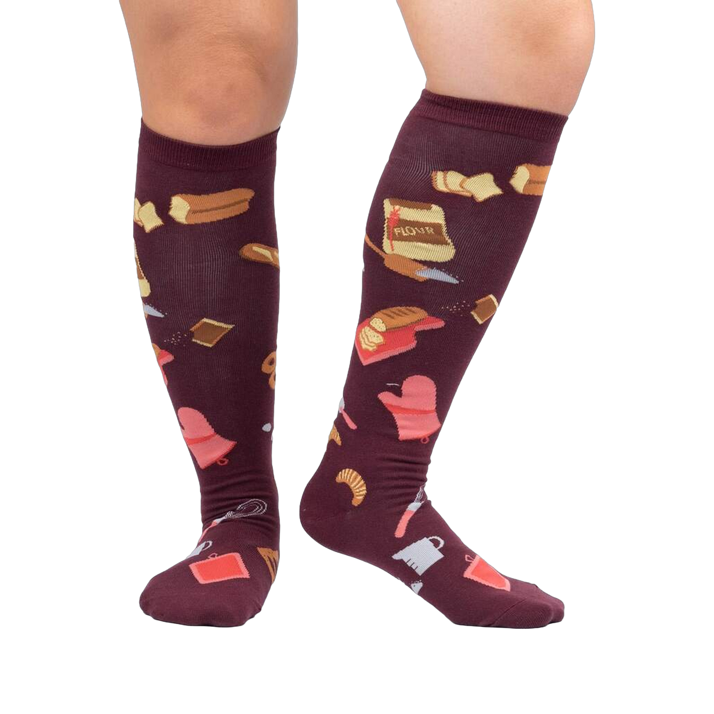 Lifestyle shot of 'Bake at 350' knee-high socks in burgundy on a person's legs against a white background.