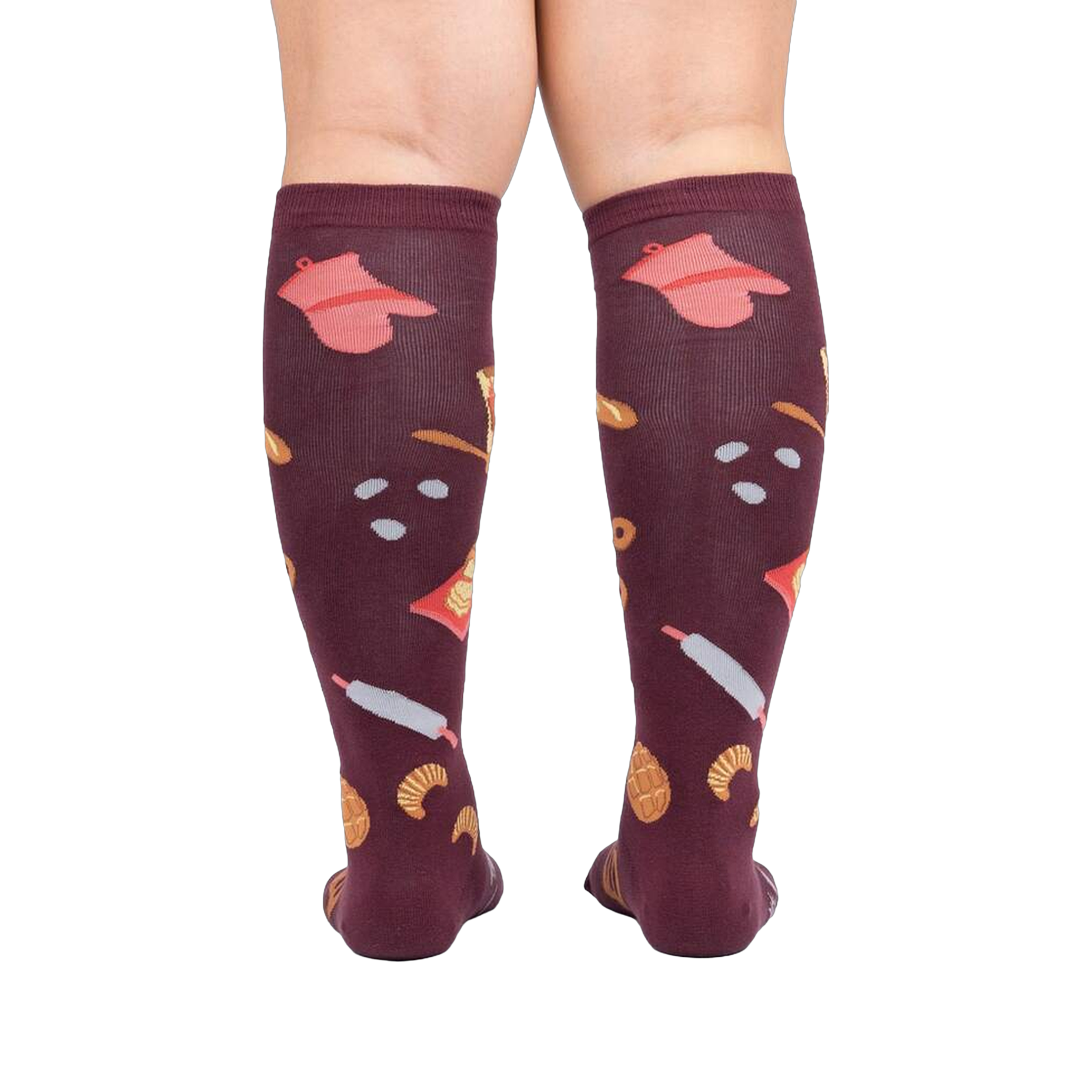 Back view of 'Bake at 350' burgundy knee-high socks on a person's legs against a white background.