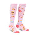 Pair of pink knee-high socks with a whimsical baking-themed pattern.  Features images of bread, flour, and other baking tools.