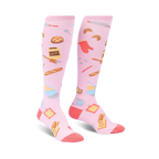 Pair of pink knee-high socks with a whimsical baking-themed pattern.  Features images of bread, flour, and other baking tools.