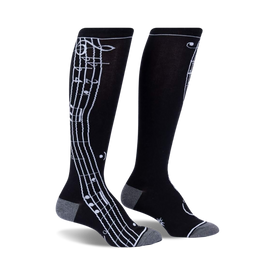 black knee-high socks decorated with a fun repeating pattern of musical notes in white, perfect for music-loving women.  