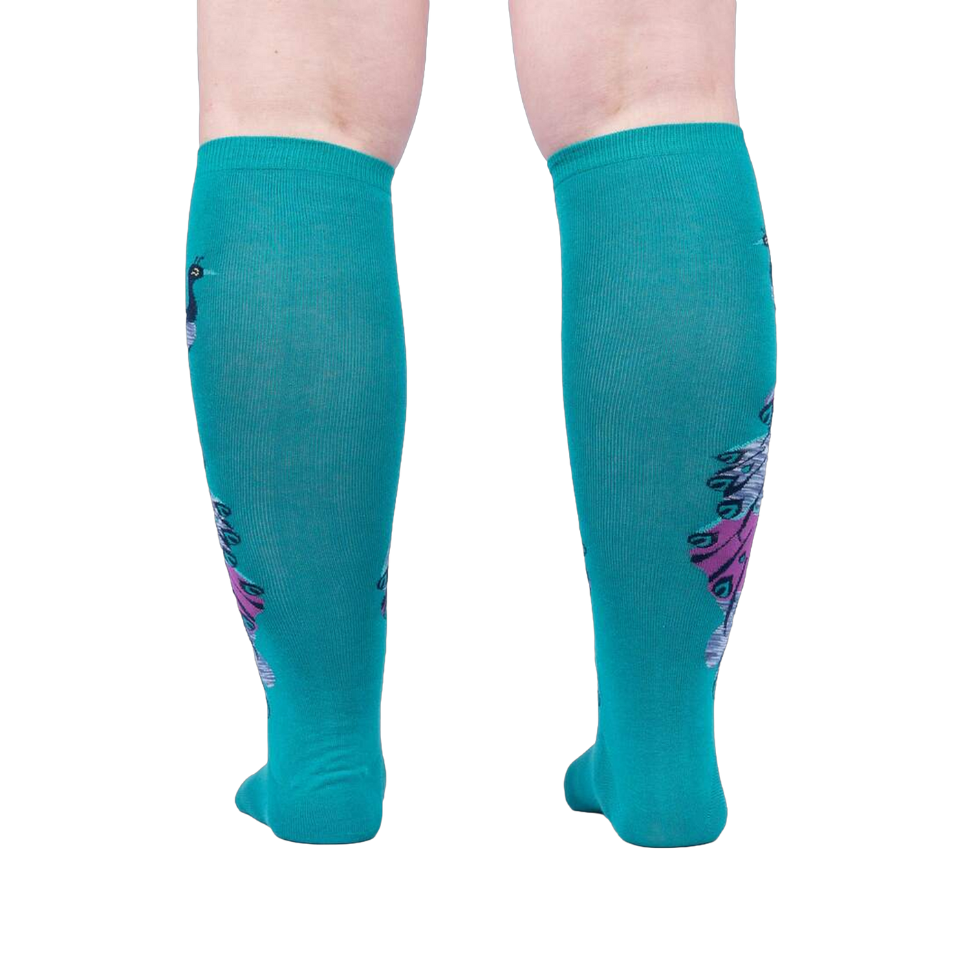Rear view of teal knee-high socks, showcasing the full peacock design on the back of the socks.