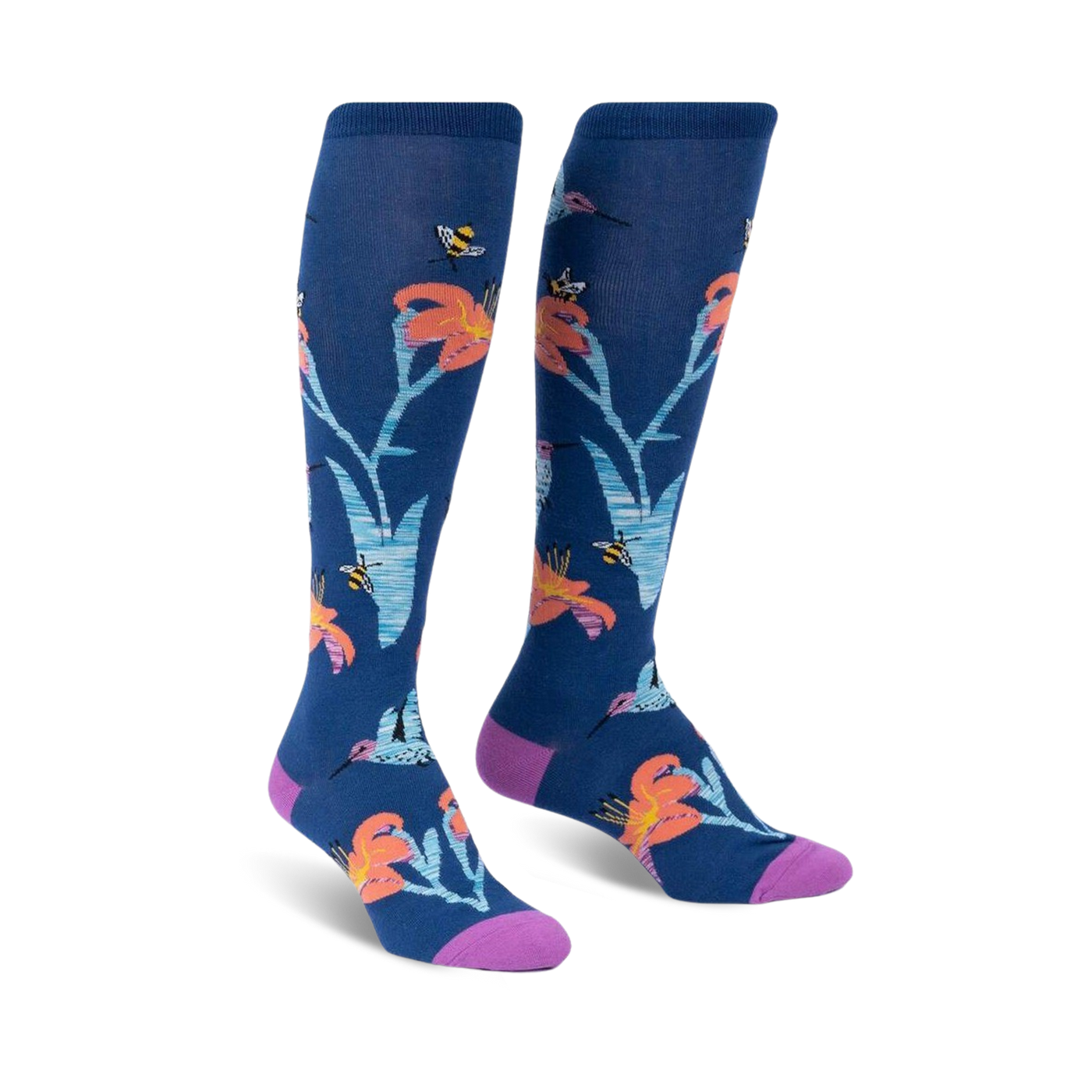 Pair of knee-high socks in navy blue.  Features a whimsical design of orange lilies, hummingbirds, and bees.