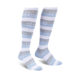 white knee-high socks with blue and gray stripes and snowflake patterns.  