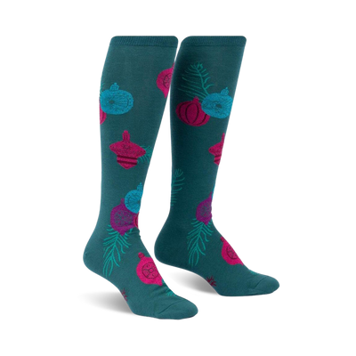 teal knee-high women's socks featuring a pattern of christmas ornaments and pine sprigs.  