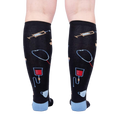 Back view of Thoracic Park socks, displaying the full design and showcasing the sock's rear print.