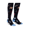 Pair of black knee-high socks with a light blue cuff.  The socks are adorned with colorful medical illustrations, including syringes, bandages, and stethoscopes.