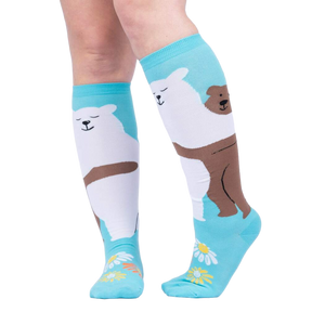 Lifestyle shot: Woman's legs wearing the 'Beary Best Friends' knee-high socks, showcasing the design and fit.
